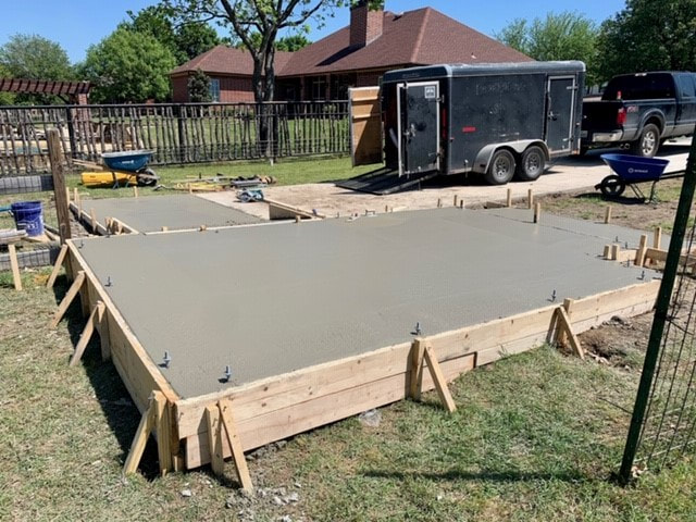 View of freshly poured shed foundation
