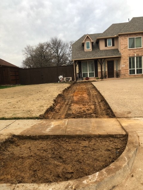 Yard dug out and prepped for concrete pour.